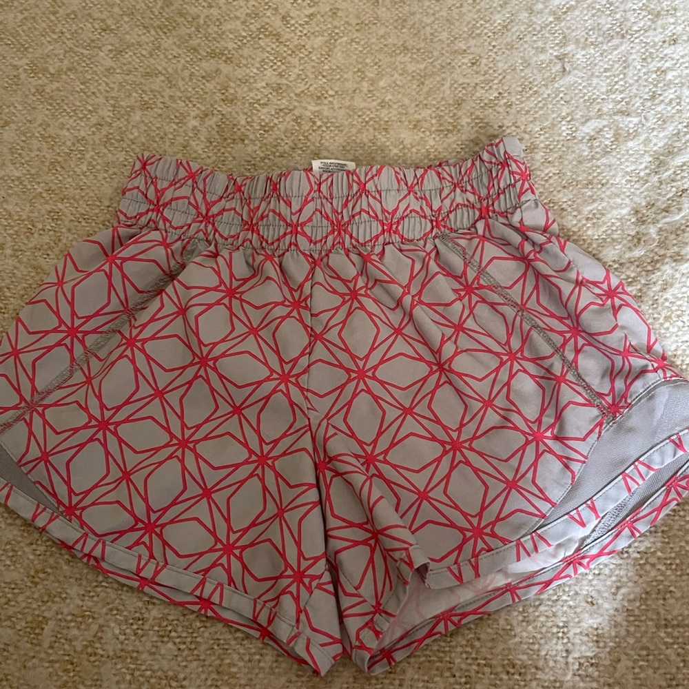 Large workout shorts. Grey and red girls size 10-12